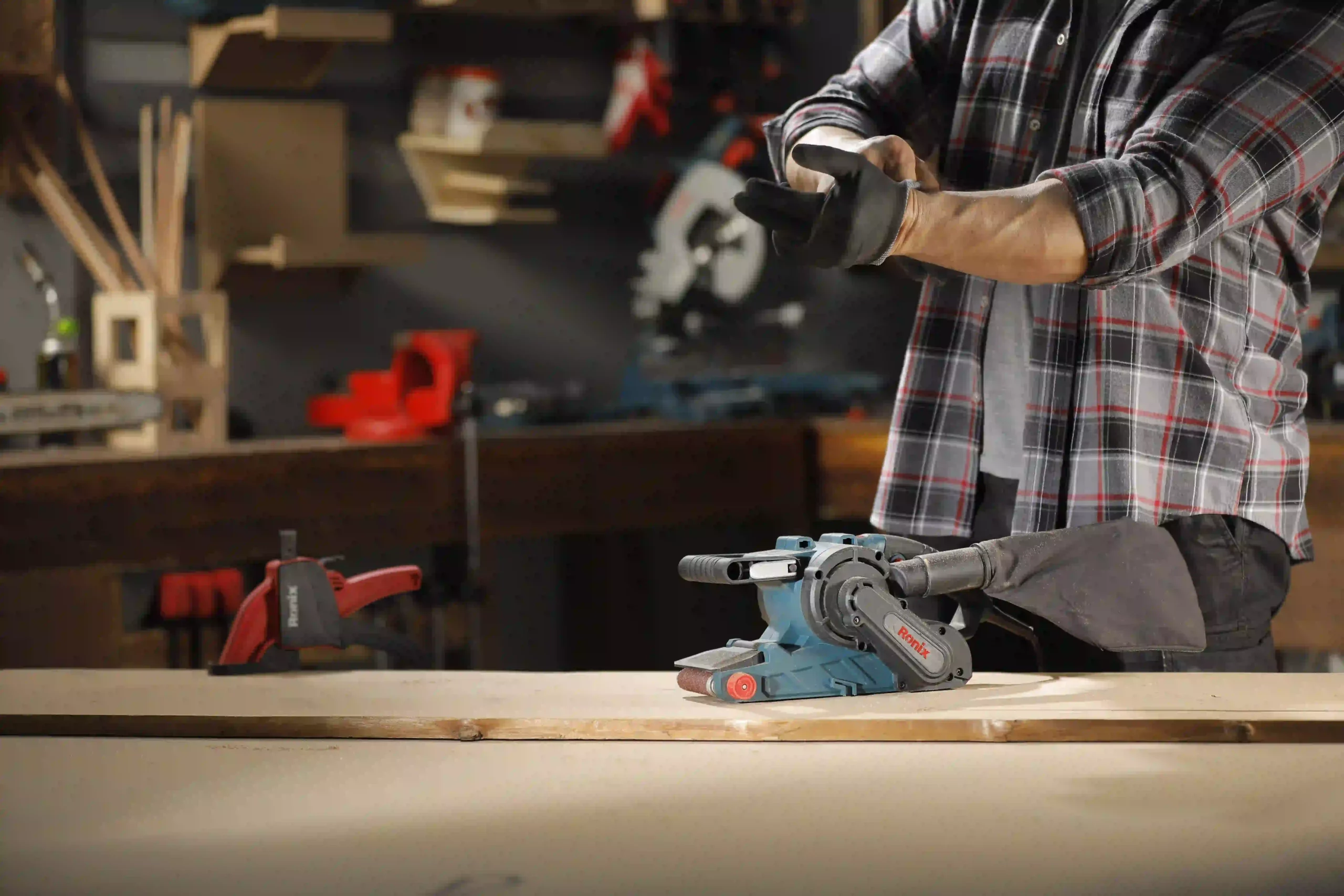 a belt sander in a workshop