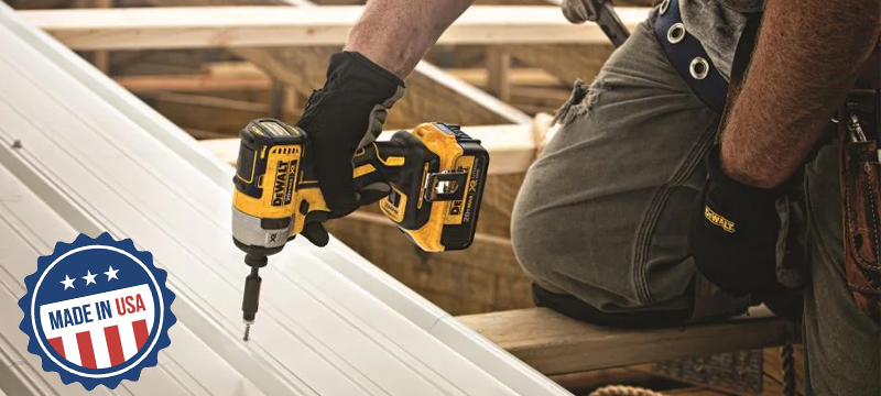 Contractor using a Dewalt drill and a Made in the USA sticker